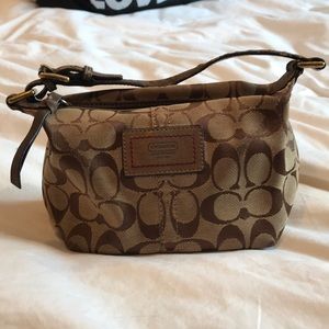 Small coach hand bag.